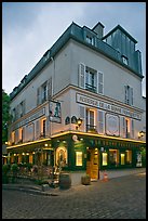 Restaurant at dusk, Montmartre. Paris, France