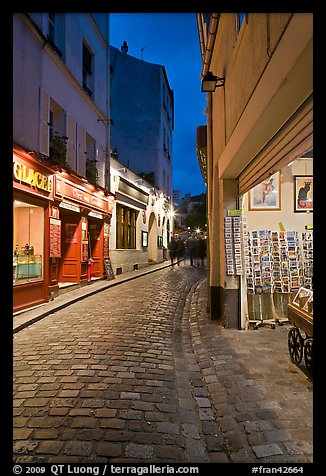 Pedestrian cobblestone street and tourist business, Montmartre. Paris, France