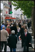 Dense pedestrian traffic on Champs-Elysees. Paris, France