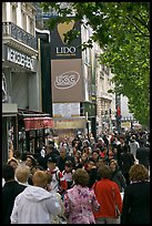 Pedestrians on a Champs-Elysees sidewalk. Paris, France