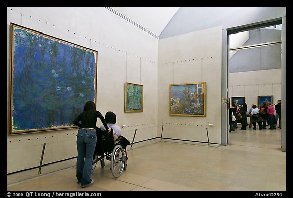 Tourist in wheelchair, Orsay Museum. Paris, France (color)