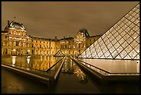 IM Pei Pyramid and Sully Wing at night, The Louvre. Paris, France