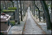 Alley and tombs in winter, Pere Lachaise cemetery. Paris, France