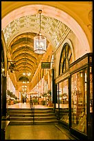 Gallery at night, passage Vivienne. Paris, France