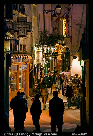 Pedestrian street with restaurants at night. Quartier Latin, Paris, France