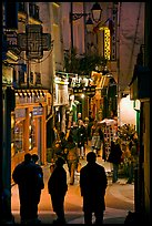 Pedestrian street with restaurants at night. Quartier Latin, Paris, France (color)