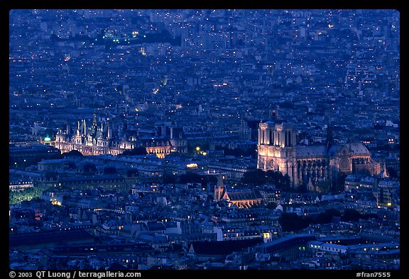 Hotel de Ville (City Hall) and Notre Dame seen from the Montparnasse Tower, dusk. Paris, France
