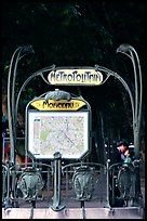 Embrace at the entrance of a metro station. Paris, France (color)