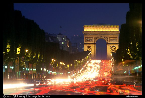 Champs Elysees and Arc de Triomphe at dusk. Paris, France (color)