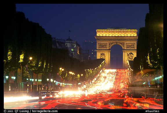 Champs Elysees and Arc de Triomphe at dusk. Paris, France