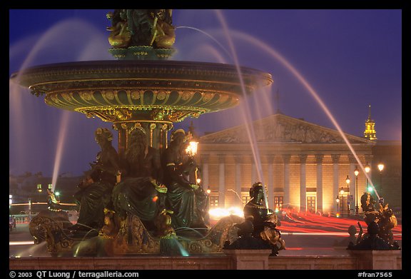 Fountain on Place de la Concorde and Assemblee Nationale by night. Paris, France