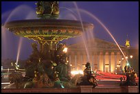 Fountain on Place de la Concorde and Assemblee Nationale by night. Paris, France (color)