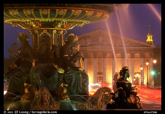 Fountain on Place de la Concorde and Assemblee Nationale by night. Paris, France (color)