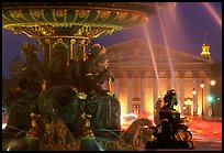 Fountain on Place de la Concorde and Assemblee Nationale by night. Paris, France (color)