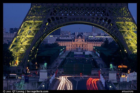 Ecole Militaire (Military Academy) seen through Tour Eiffel  at dusk. Paris, France (color)