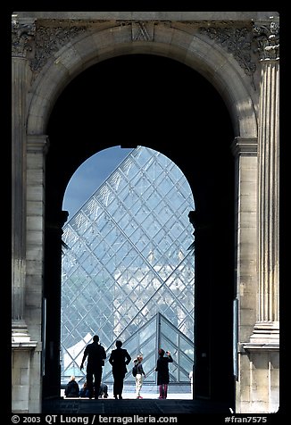 Pyramid seen through one of the Louvre's Gates. Paris, France (color)