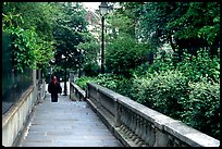 Alley borded by gardens, Montmartre. Paris, France