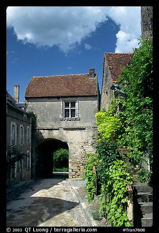 Street and old town gate, Vezelay. Burgundy, France