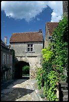 Street and old town gate, Vezelay. Burgundy, France