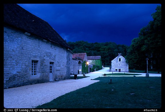 Gardens, approaching evening storm, Fontenay Abbey. Burgundy, France (color)