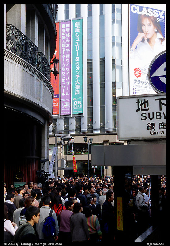 Crowds on the street near the Ginza subway station. Tokyo, Japan