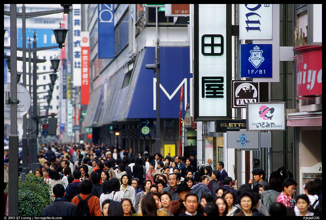 Crowded avenue in the Ginza shopping district. Tokyo, Japan