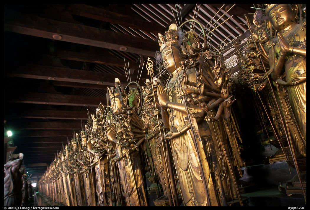 Rows of statues of the thousand-armed Kannon (buddhist goddess of mercy), Sanjusangen-do Temple. Kyoto, Japan