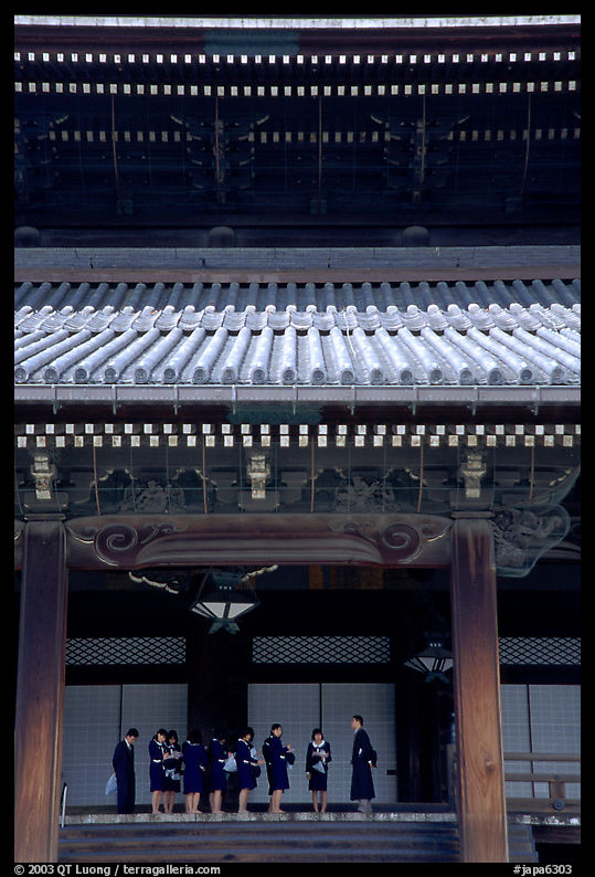 Uniformed schoolgirls visit Higashi Hongan-ji Temple. Kyoto, Japan