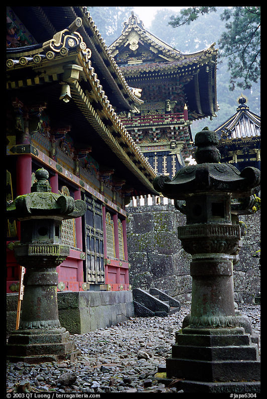 Urns, pavilion, and main hall in Tosho-gu Shrine. Nikko, Japan