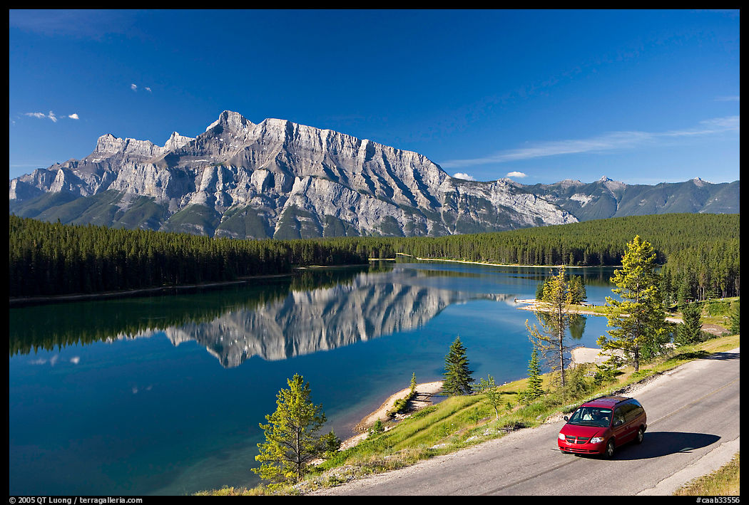 Car on the road besides Two Jack Lake. Banff National Park, Canadian Rockies, Alberta, Canada