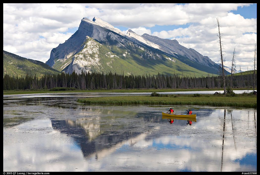 Canoe and Mt Rundle reflection in first Vermillion Lake, afternon. Banff National Park, Canadian Rockies, Alberta, Canada