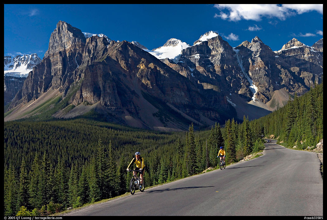 Cyclists on the road to the Valley of Ten Peaks. Banff National Park, Canadian Rockies, Alberta, Canada