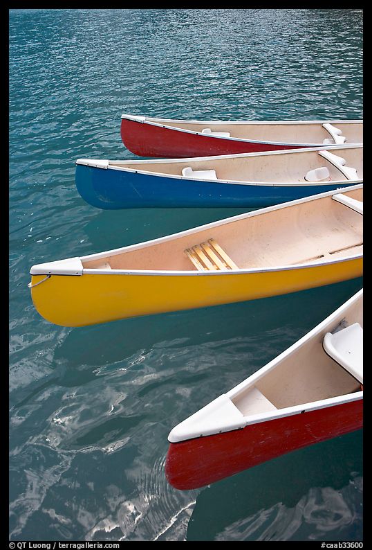 Close up of red, yellow and blue canoes, Moraine Lake. Banff National Park, Canadian Rockies, Alberta, Canada