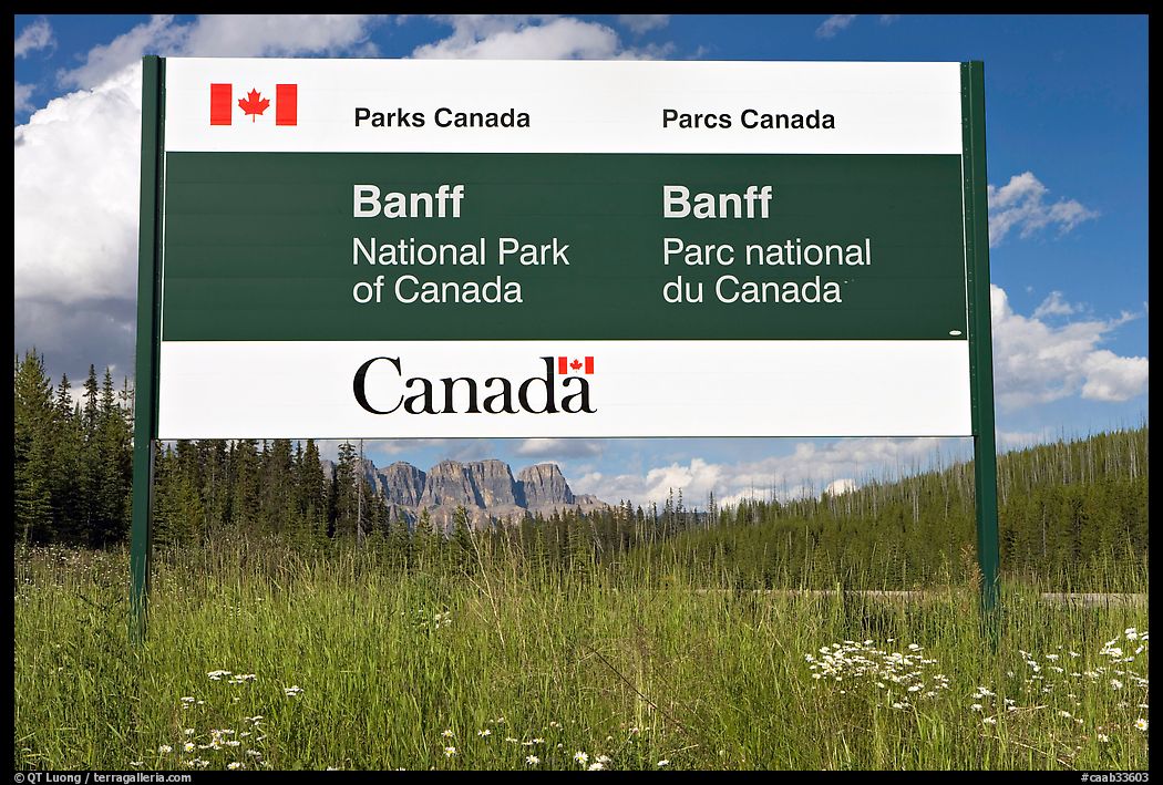 Bilingual sign at the entrance of the Park. Banff National Park, Canadian Rockies, Alberta, Canada