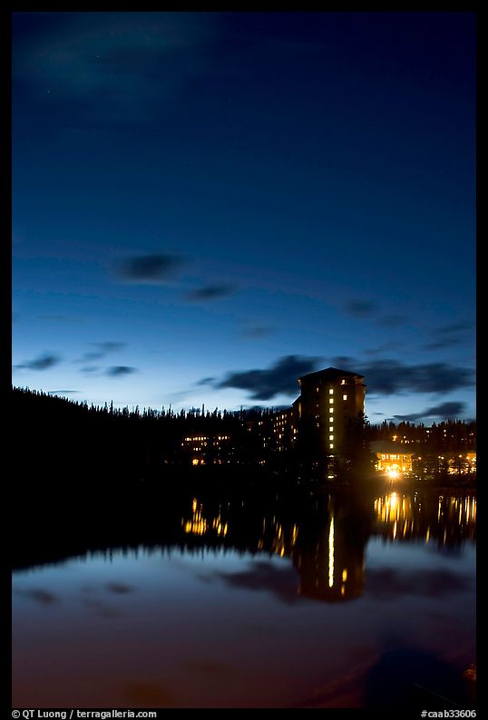 Chateau Lake Louise reflected in Lake at night. Banff National Park, Canadian Rockies, Alberta, Canada