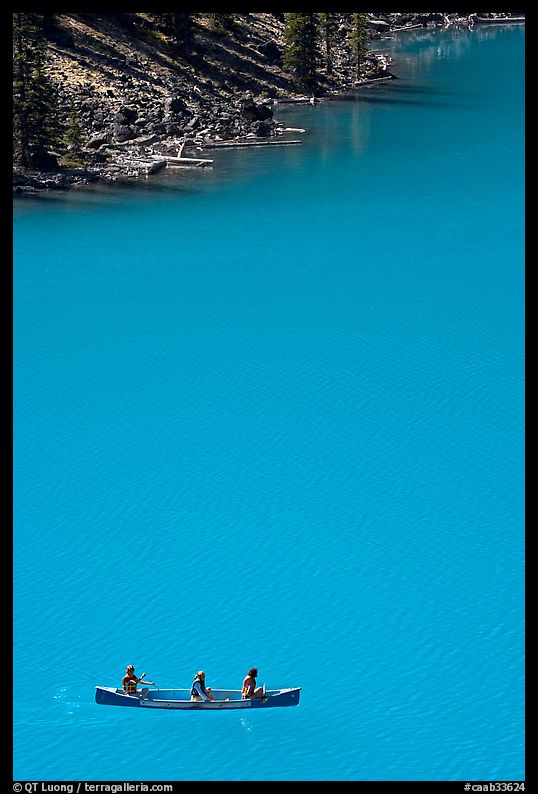 Canoe floatting in Robins egg blue water of Moraine Lake. Banff National Park, Canadian Rockies, Alberta, Canada