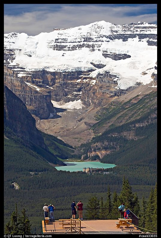 Visitors at observation platform, looking at  Lake Louise and  Victoria Peak. Banff National Park, Canadian Rockies, Alberta, Canada