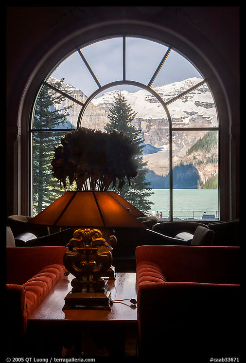 Lake Louise seen through a window of Chateau Lake Louise hotel. Banff National Park, Canadian Rockies, Alberta, Canada