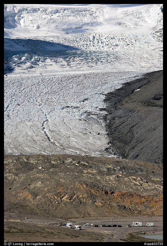 Parking lot dwarfed by Athabasca Glacier. Jasper National Park, Canadian Rockies, Alberta, Canada