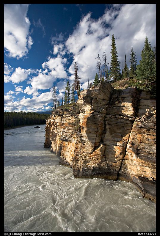 Athabasca River and cliff, late afternoon. Jasper National Park, Canadian Rockies, Alberta, Canada