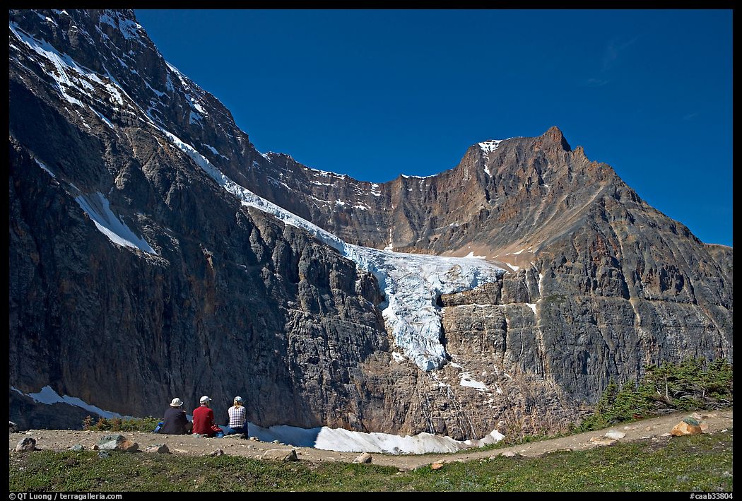 Hikers look at Angel Glacier, late morning. Jasper National Park, Canadian Rockies, Alberta, Canada