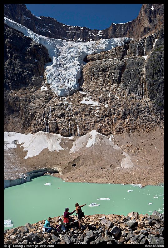 Family looking at Cavell Pond and Angel Glacier. Jasper National Park, Canadian Rockies, Alberta, Canada