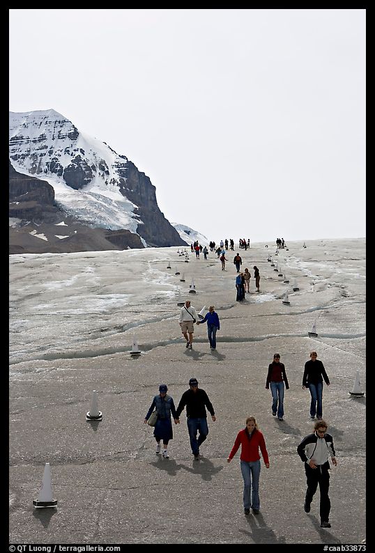 Tourists descending Athabasca Glacier. Jasper National Park, Canadian Rockies, Alberta, Canada