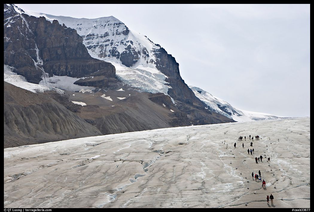 Toe of Athabasca Glacier with visitors in delimited area. Jasper National Park, Canadian Rockies, Alberta, Canada