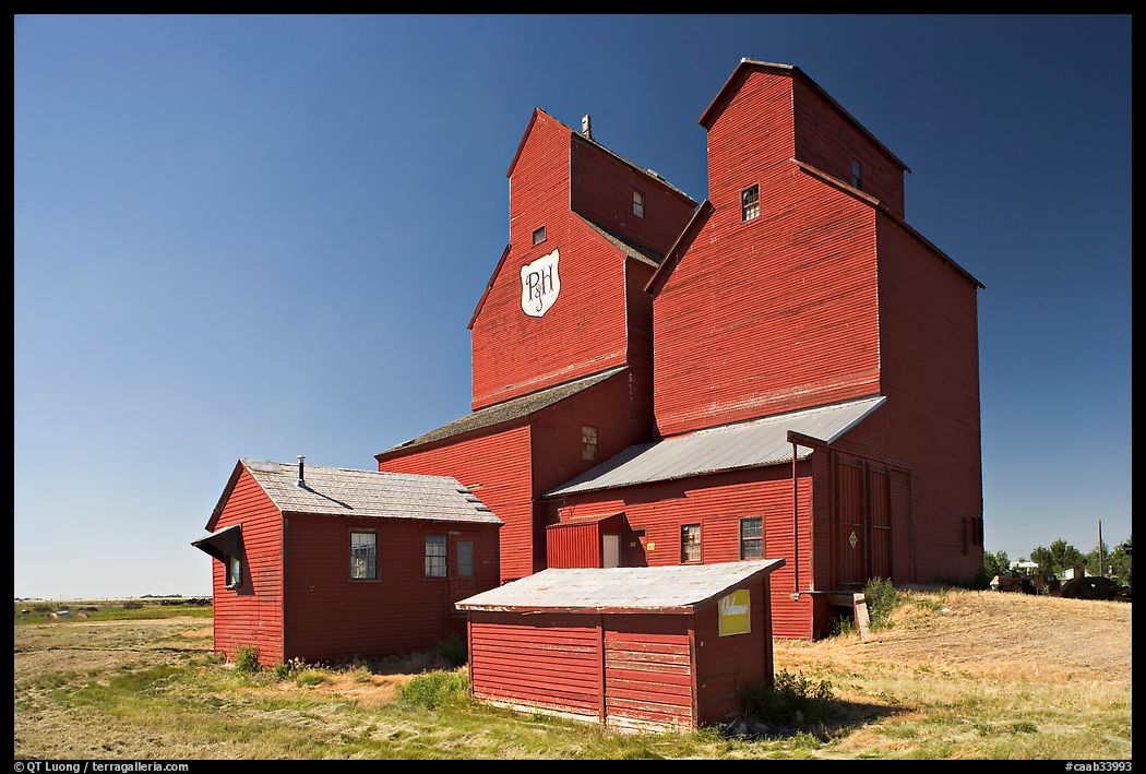 Red wooden grain elevator building. Alberta, Canada