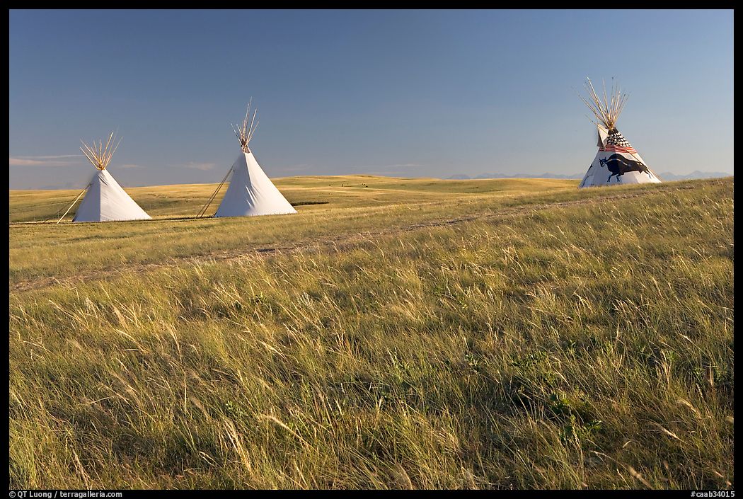 Teepees and tall grass prairie, Head-Smashed-In Buffalo Jump. Alberta, Canada