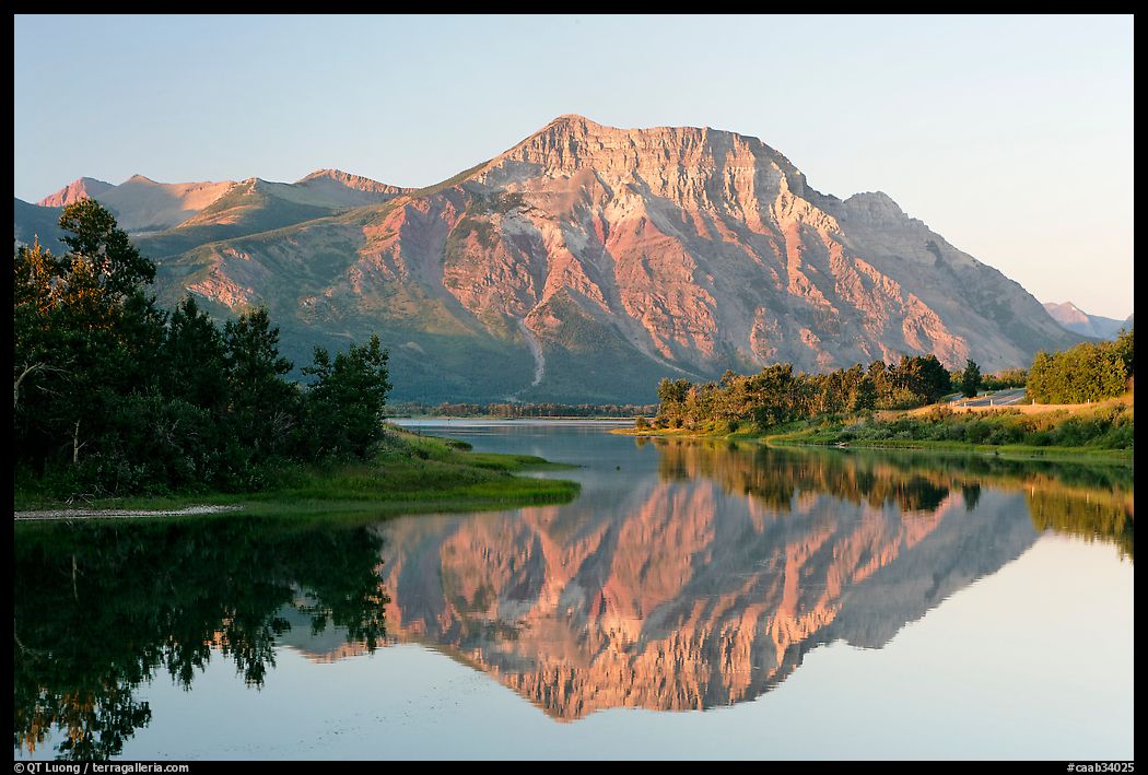 Vimy Peak reflected in Middle Waterton Lake, sunrise. Waterton Lakes National Park, Alberta, Canada