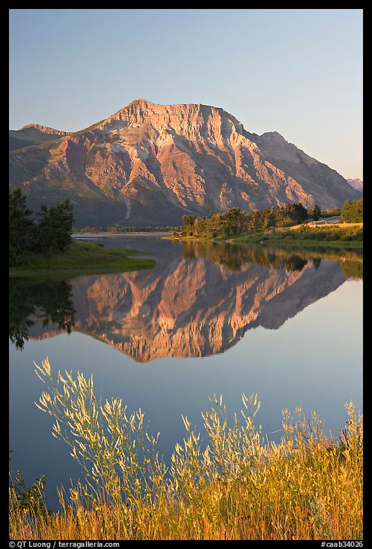 Vimy Peak and reflexion in Middle Waterton Lake, sunrise. Waterton Lakes National Park, Alberta, Canada