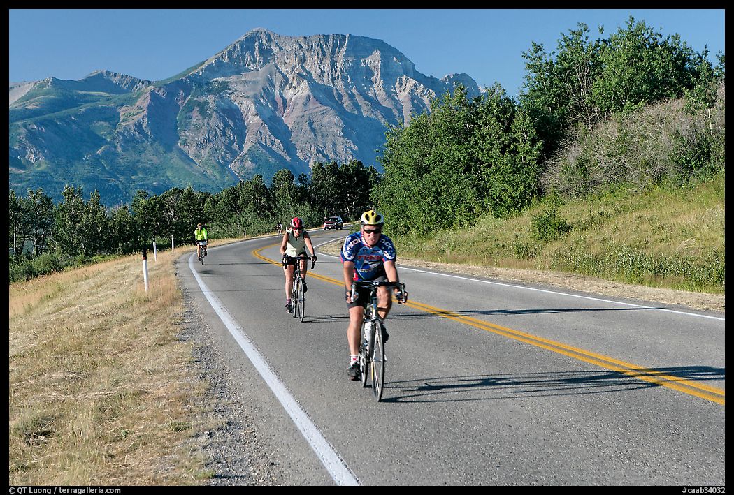 Cyclists on road. Waterton Lakes National Park, Alberta, Canada