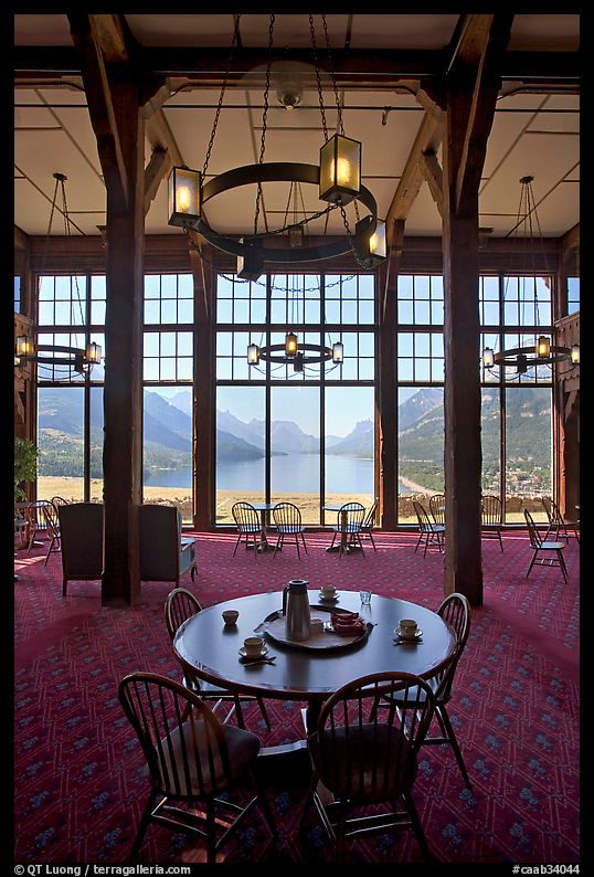 Table in lobby of Prince of Wales hotel with view over Waterton Lake. Waterton Lakes National Park, Alberta, Canada